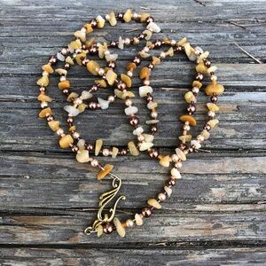 Long golden calcite, brown faux pearl and seed bead necklace earth tones